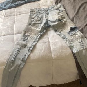 Distressed biker jeans